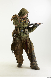 Photos John Hopkins Army Postapocalyptic Suit Poses aiming the gun…